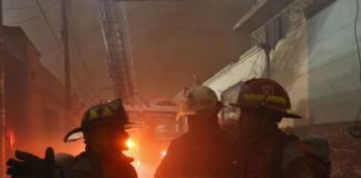 Almacén de llantas se incendia y afecta casas