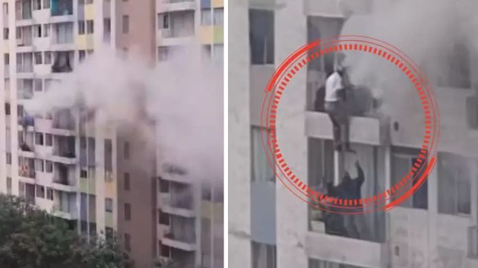Huyen de incendio en en El Agustino trepando paredes