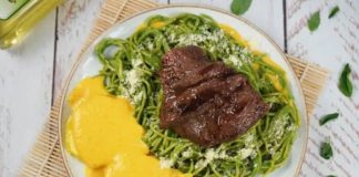 Tallarines verdes con salsa a la huancaína